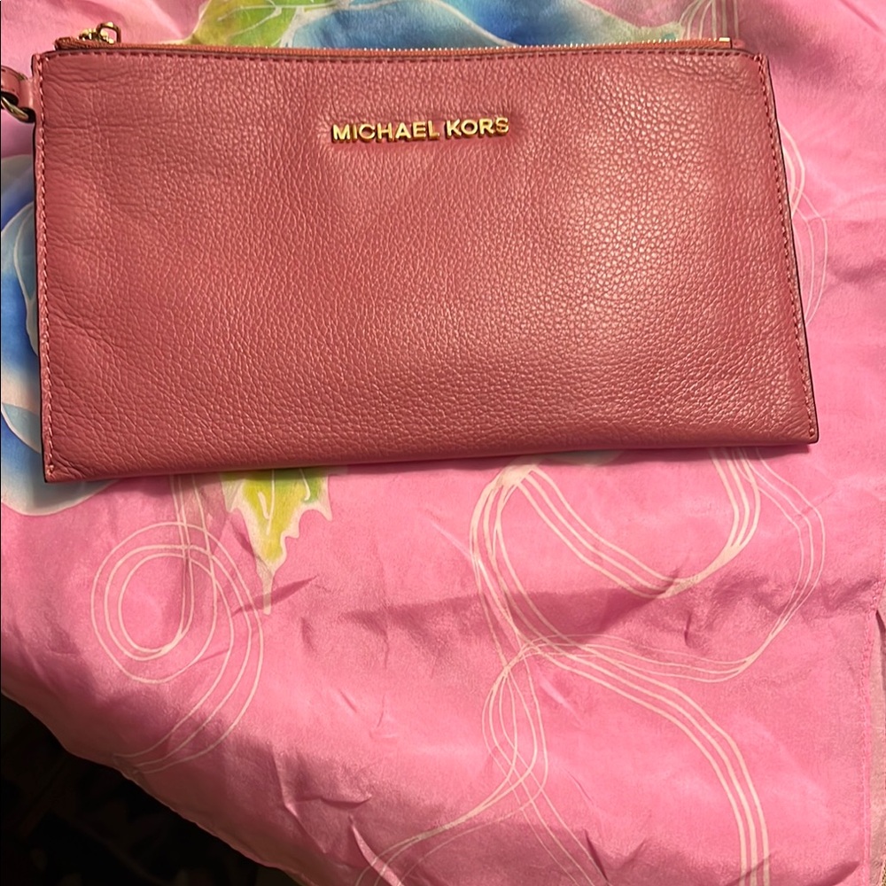 Michael Kors Softly hued Coral Pink Pebbled Leather Wristlet